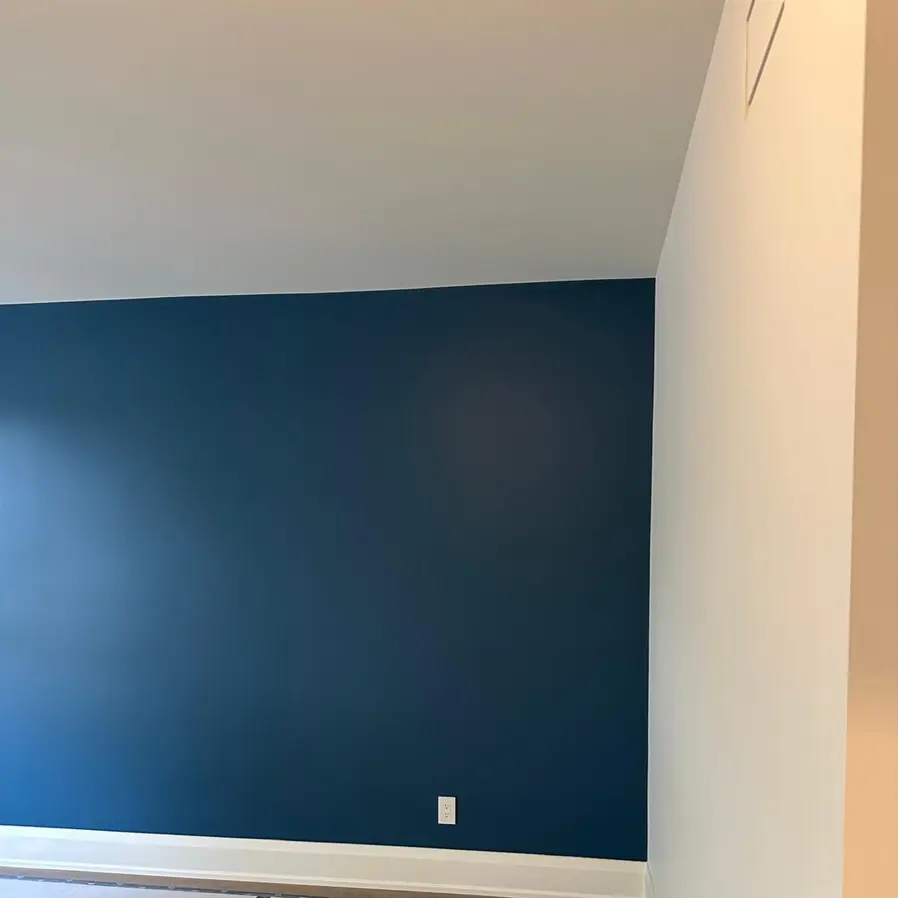 Professional Toronto painters performing interior painting service - expert surface preparation and premium paint application for condo walls