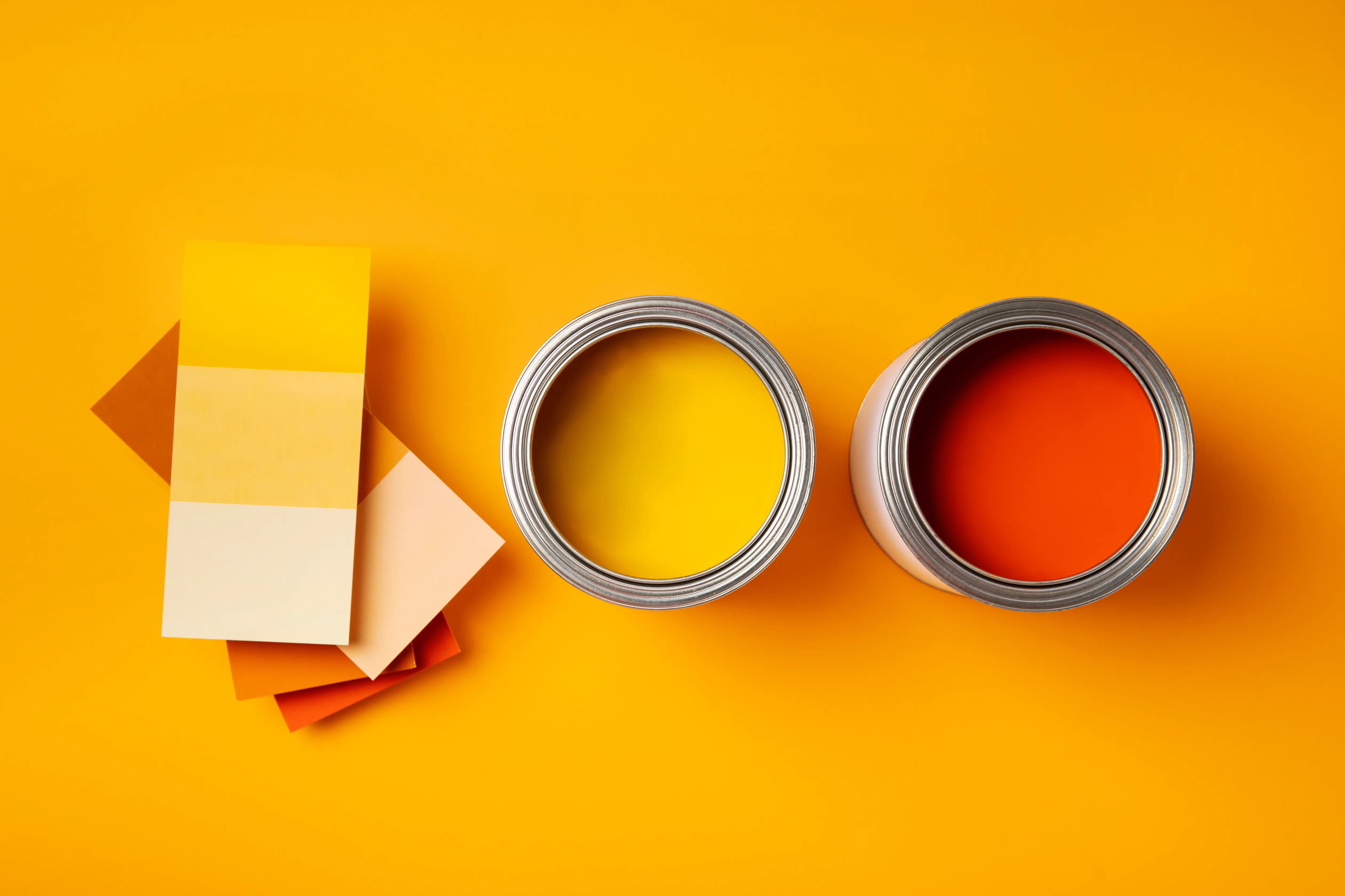 Benjamin Moore paint colour swatches and sample chips fanned out on a Toronto kitchen counter